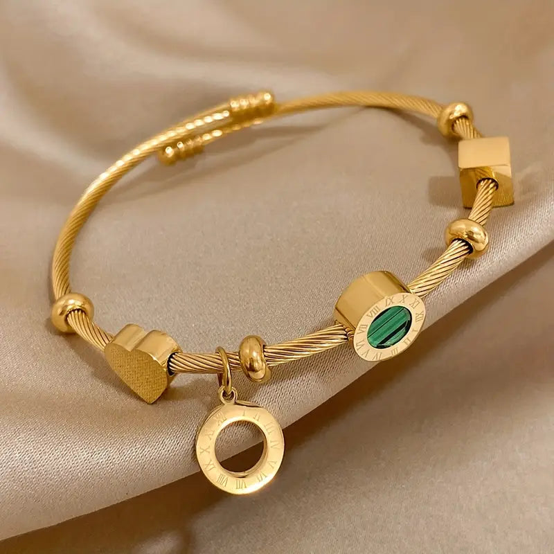 Rhian – Goldenes Armband mit Unterschrift