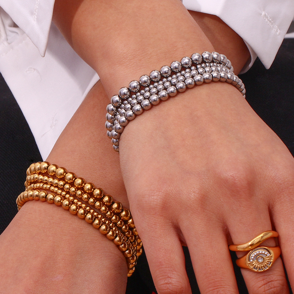 Crea - Elegantes stapelbares goldenes Metallarmband (4mm)