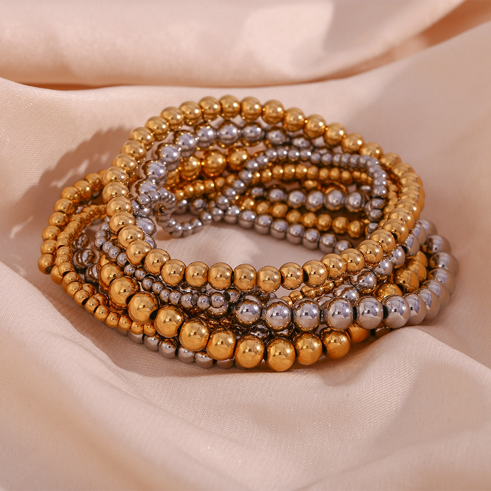 Crea - Elegantes stapelbares goldenes Metallarmband (4mm)
