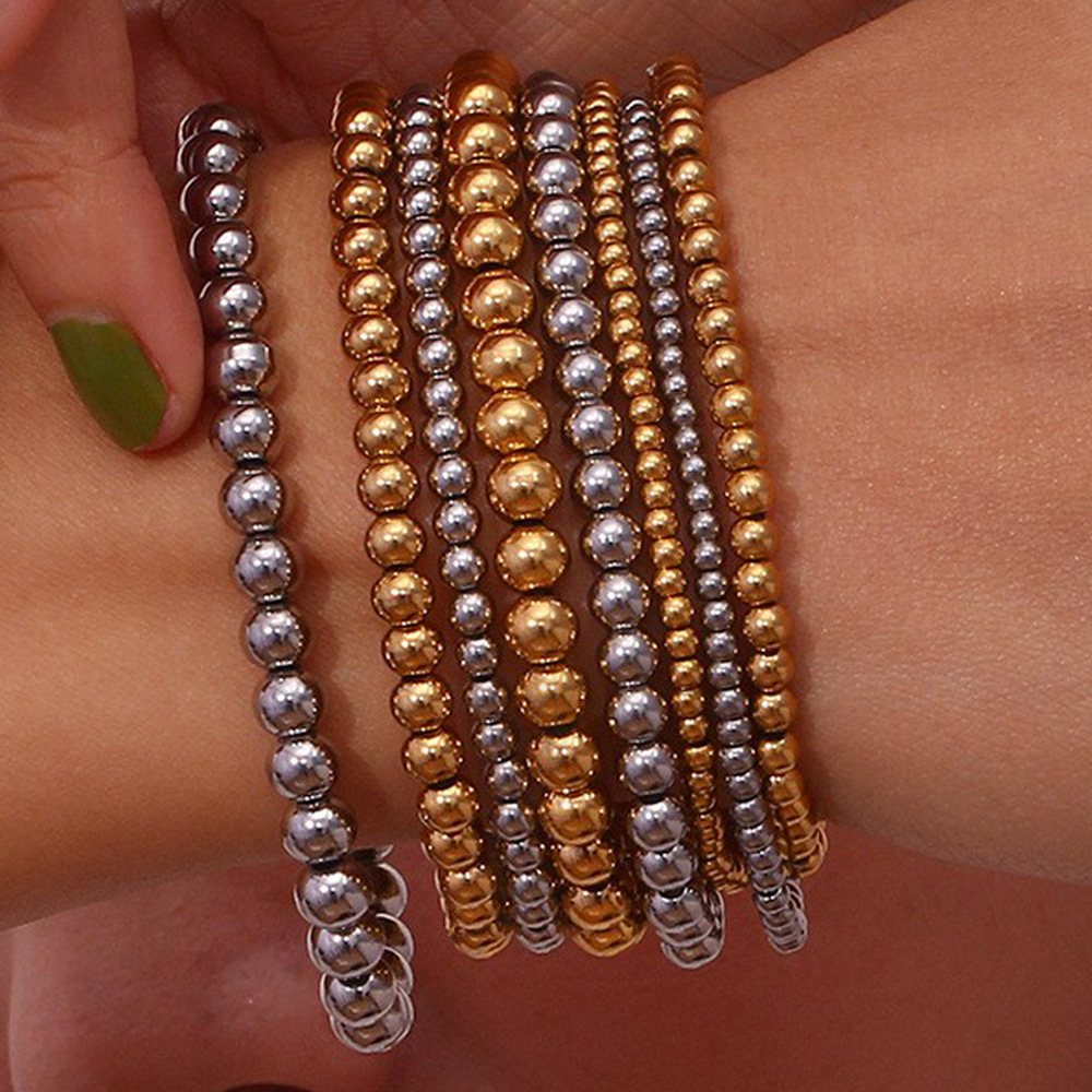 Crea - Elegantes stapelbares goldenes Metallarmband (4mm)