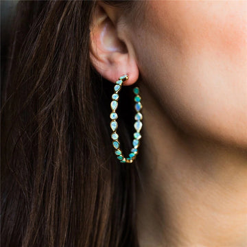 Glänzende Eleganz - Ohrringe mit blauem Opal und Gold