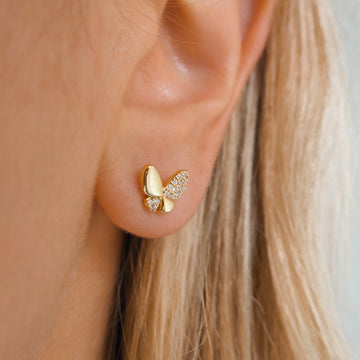 Ohrringe in Schmetterlingsform mit glitzernden Steinen