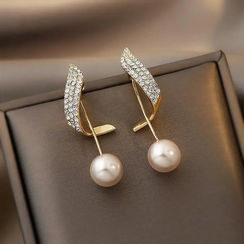 Lumine – Stilvolle Ohrringe mit Perlen und edlem Gold