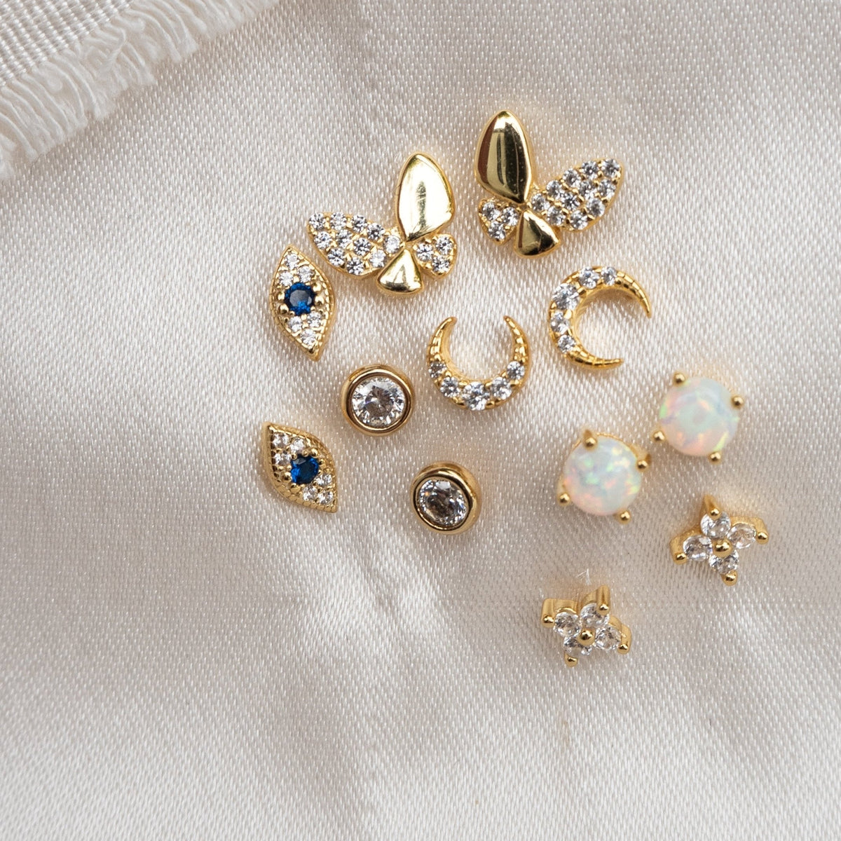 Ohrringe in Schmetterlingsform mit glitzernden Steinen