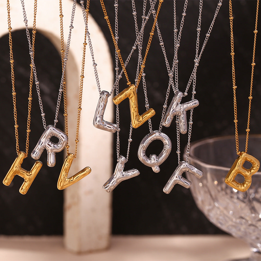 Ballon-Halskette mit goldenen Buchstaben