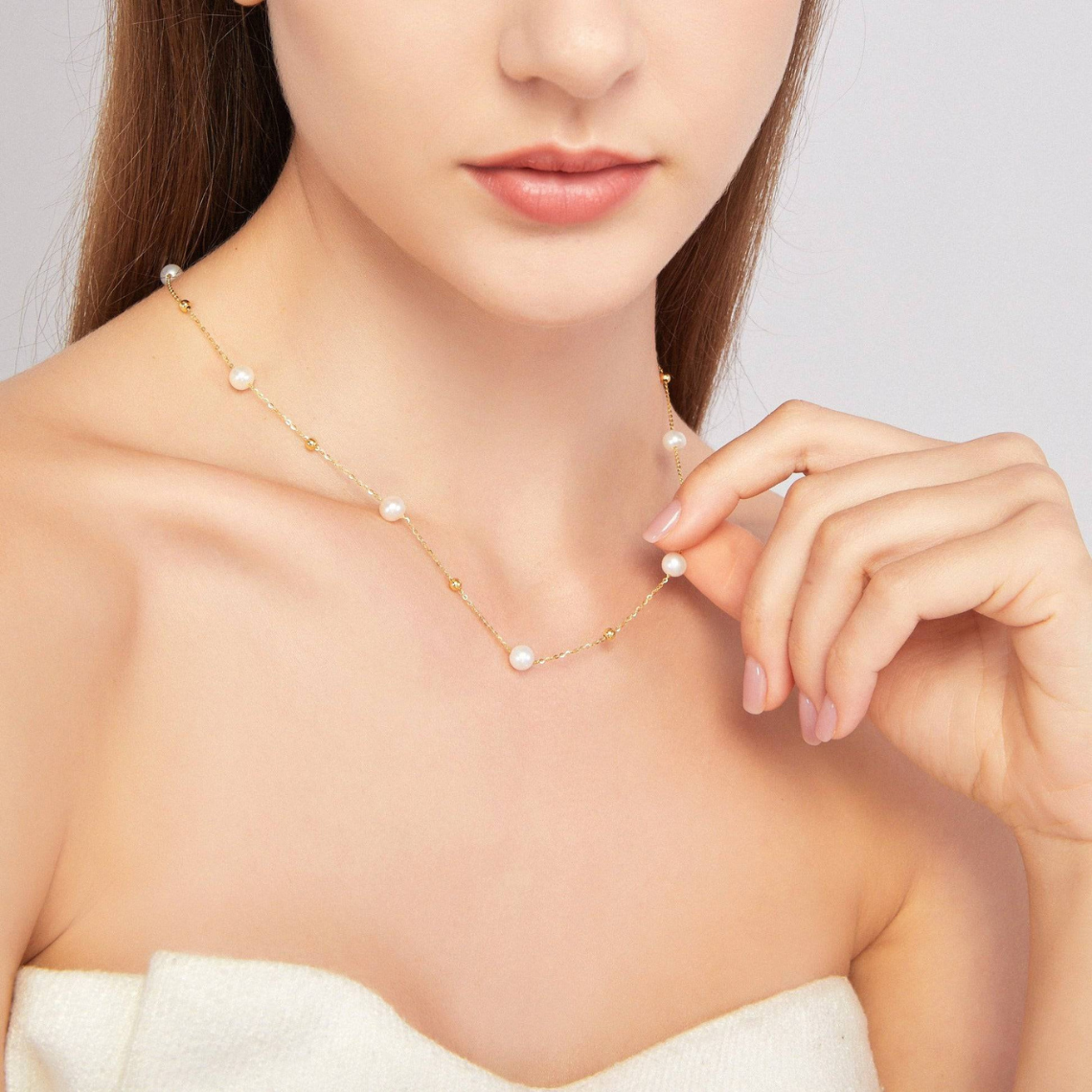 Kette mit Gold und Perlen - abwechselnd Perlen und goldene Glieder
