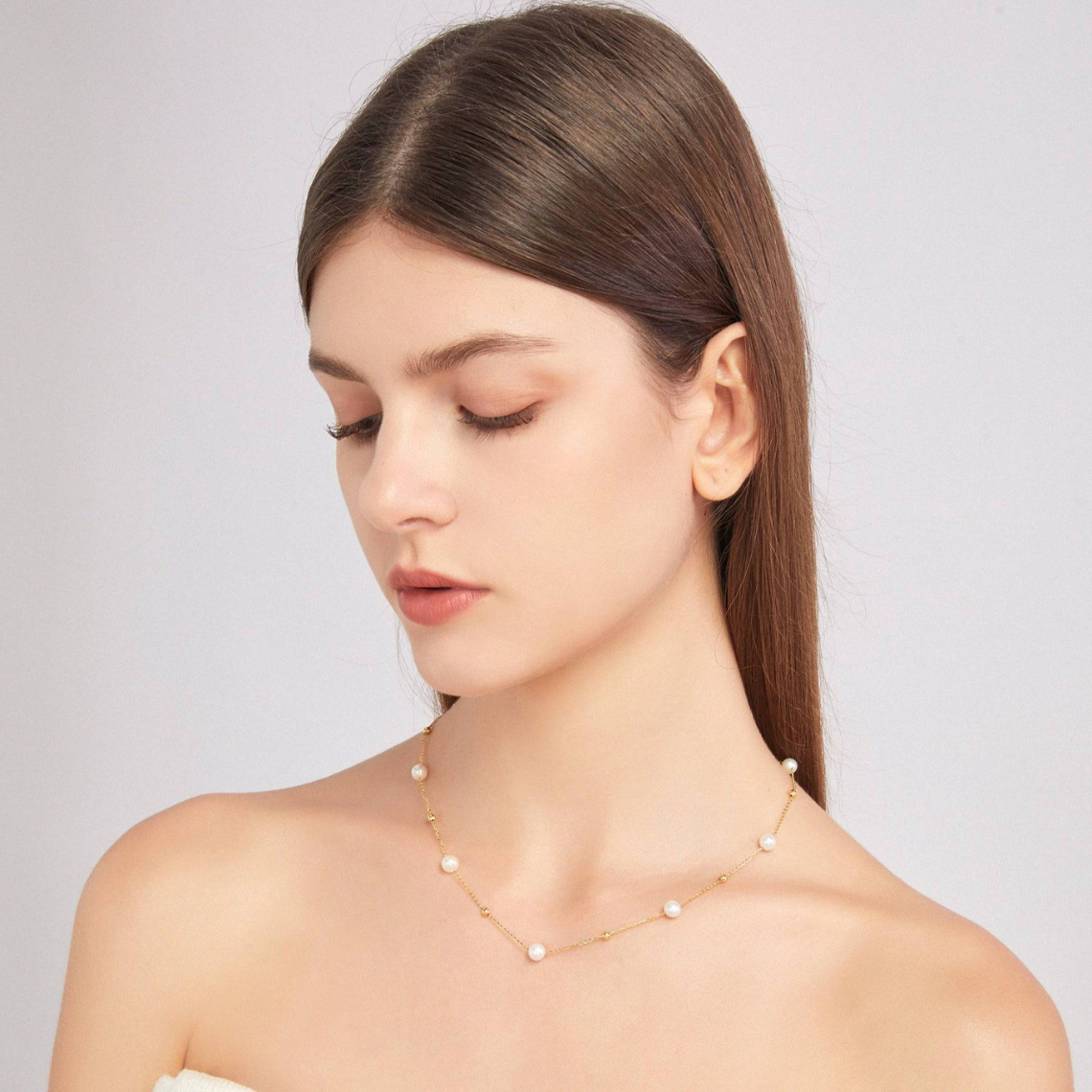 Kette mit Gold und Perlen - abwechselnd Perlen und goldene Glieder