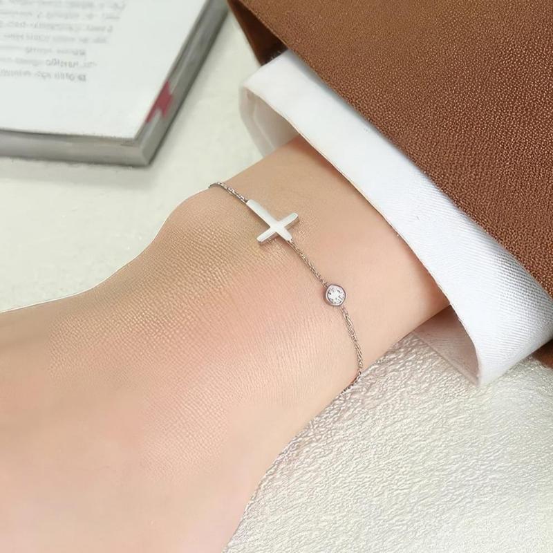 Althea – Damenarmband mit Kreuz in Gold und Silber