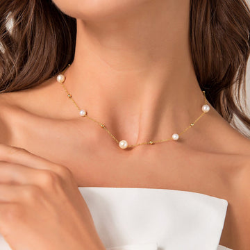Kette mit Gold und Perlen - abwechselnd Perlen und goldene Glieder