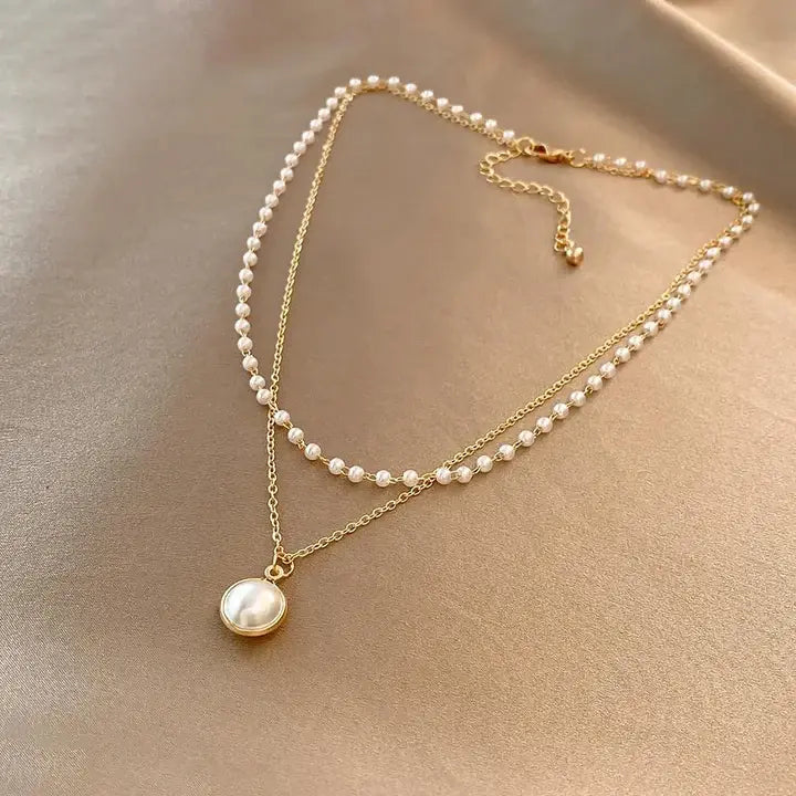 Auriane – elegante Perlen- und Goldkette-Halskette